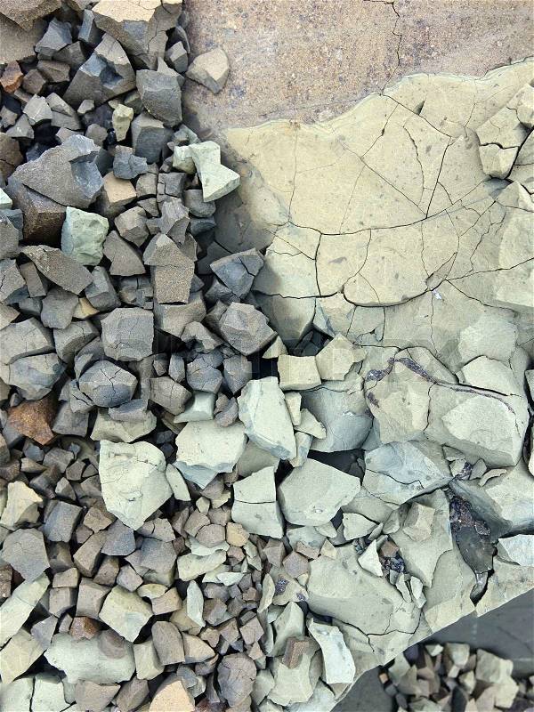 Beautifully shaped rocks and stones in Iceland. Creme coloured, blue and grey, stock photo