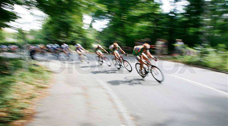 Squad passing by in the bicycle race Around Denmark 2008 - Motion blur, stock photo