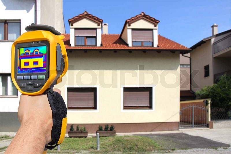 Recording Heat Loss at the House With Infrared Thermal Camera, stock photo