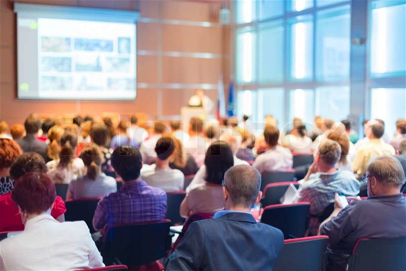 Business Conference and Presentation. Audience at the conference hall, stock photo