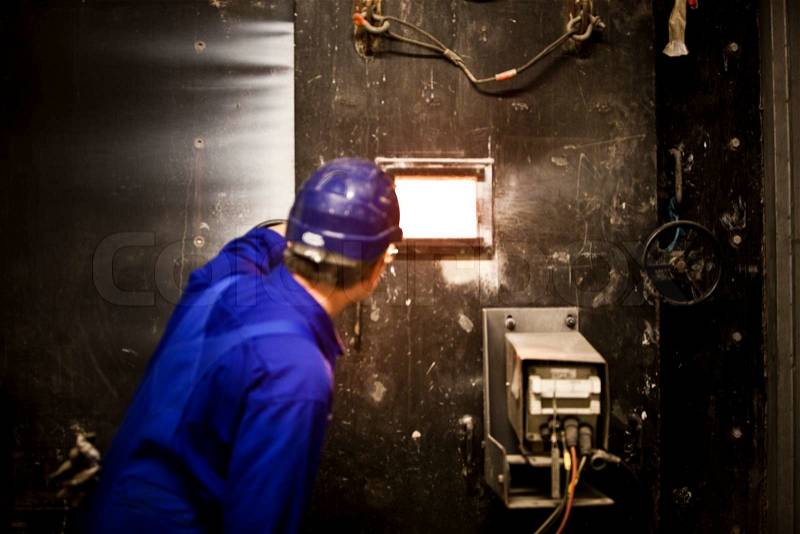 A skilled worker in an industrial site, stock photo