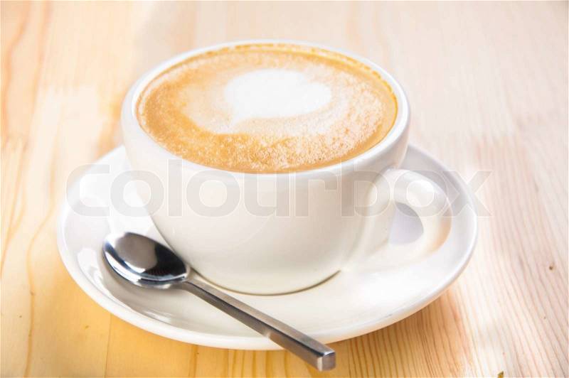 A cup of coffee with milk, stock photo