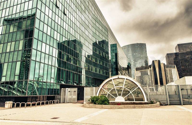 PARIS, JUNE 17: Modern buildings in the major business district, La Defense, in the western of Paris, France on June 17, 2014. Here are many of the Paris urban area\'s tallest high-rises, stock photo