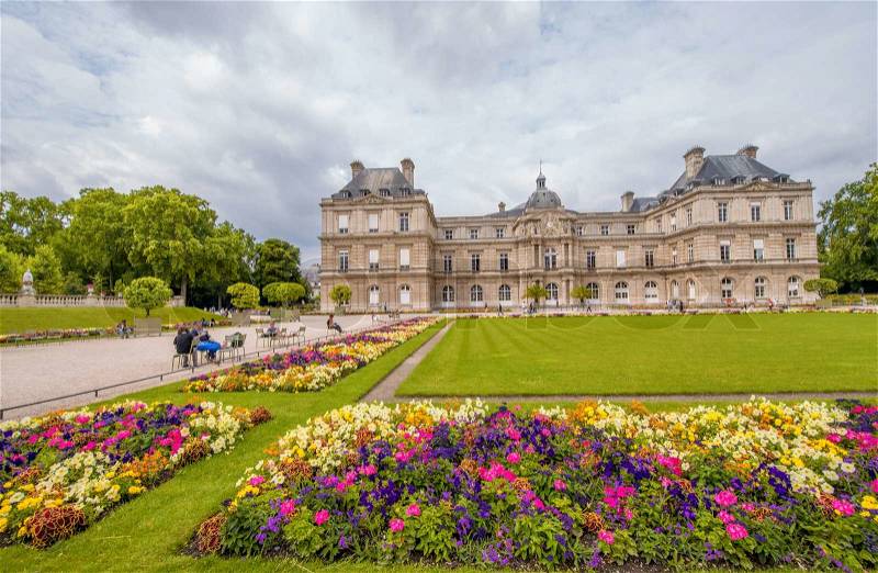 Flowers and buildings of Luxembourg Gardens in Paris, stock photo