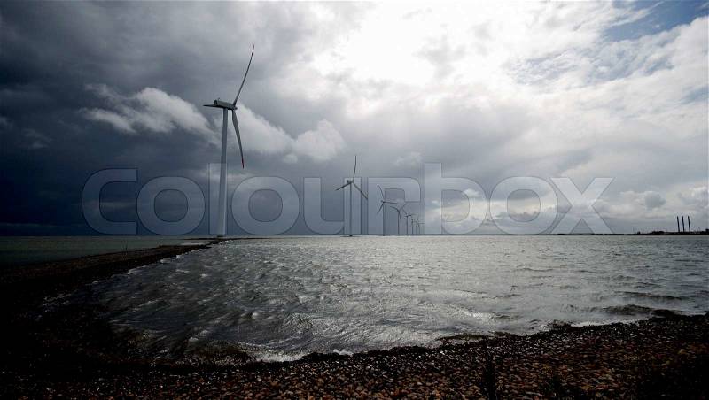 Offshore Danish wind farm form Jutland, Denmark. Roenland Wind Park from year 2002. Bad weather, stock photo