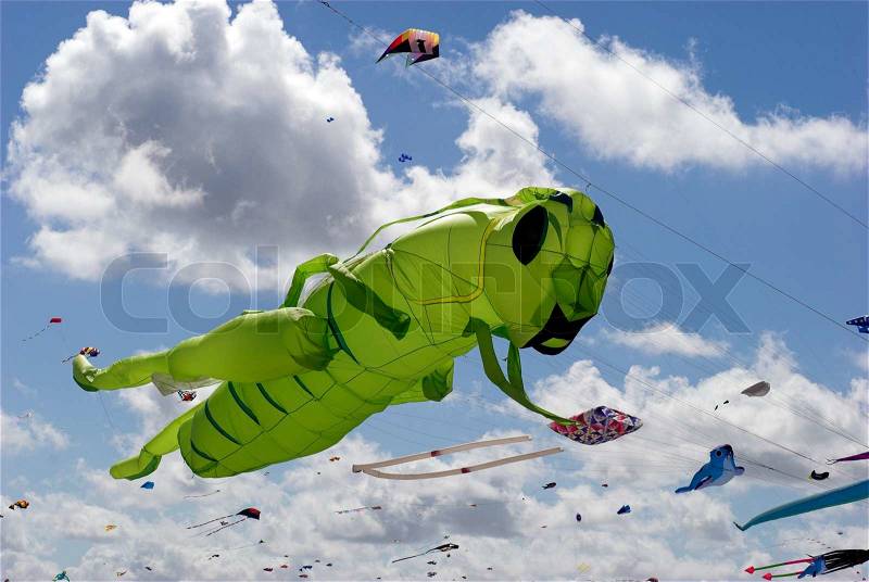 Fantasy Kite High-Up in the Sky a Sunny Day on the Beach, stock photo