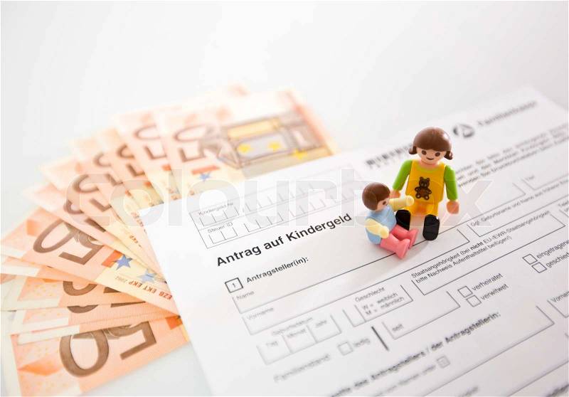 Euro bills and application for child support in german, stock photo