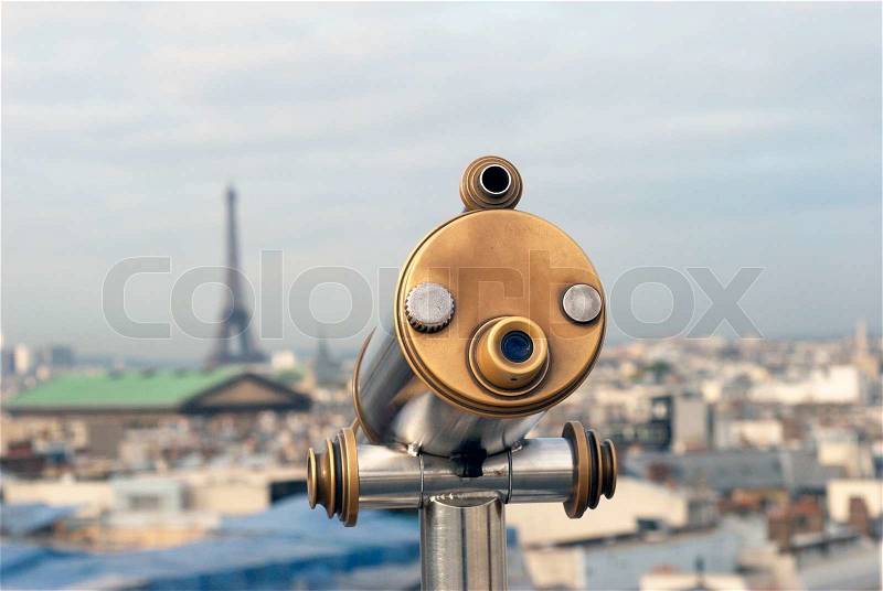 Pay and View. Coin-Operated binoculars high up over Paris in France. View from Gallery de La Fayette, stock photo