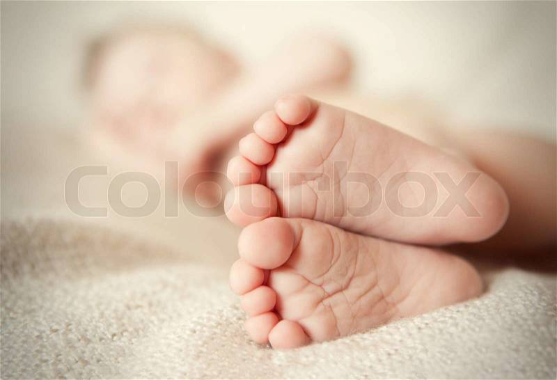 Tiny little feet, stock photo