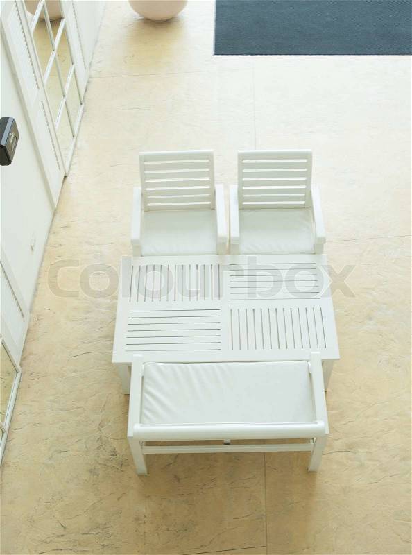 White chair and table, stock photo