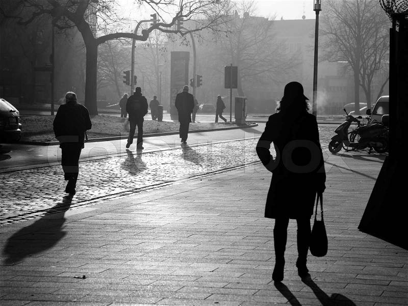 Cold December morning - people hurry to their jobs, stock photo