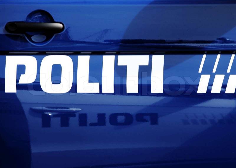 Police - logo on blue Danish police car, stock photo