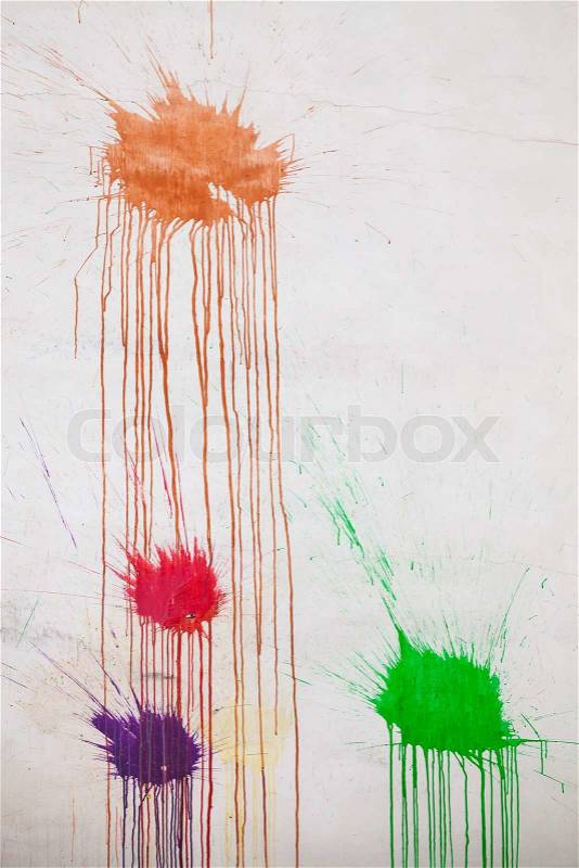 Abstract background texture, colorful paint splashes on white wall, stock photo