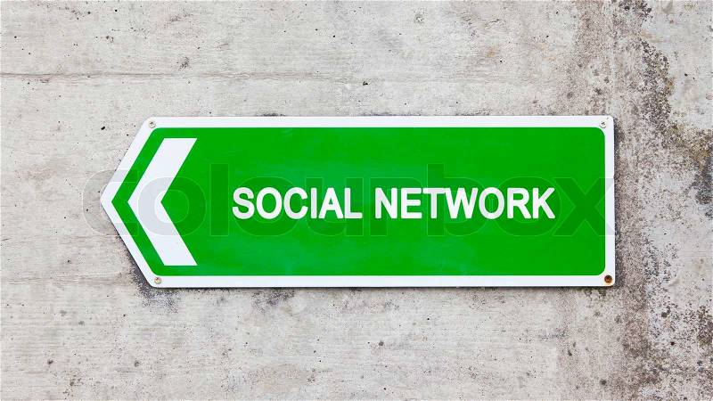 Green sign on a concrete wall - Social network, stock photo