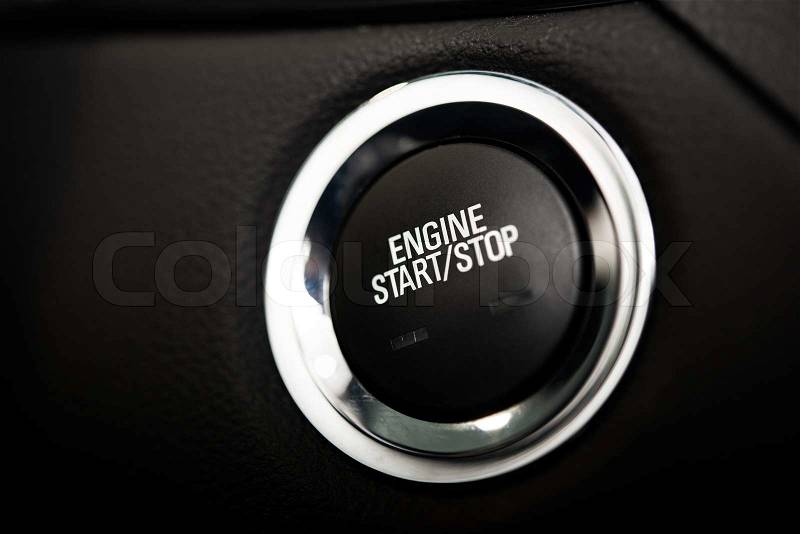 Car Engine Start Button. Black and Chrome Materials Ignite Button. Push Start Vehicle Button, stock photo