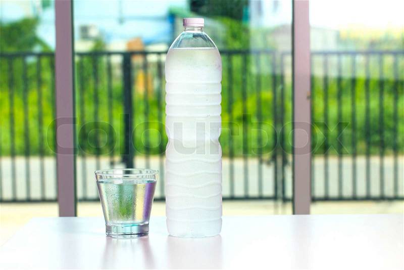 Bottle of water and glass , stock photo