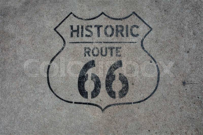 Close up view of historic rout 66 mark on asphalt surface, stock photo