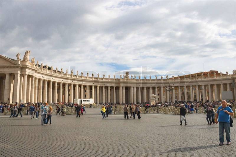 VATICAN CITY , ITALY - MAY 03, 2014: People on Saint Peter\'s Square, stock photo