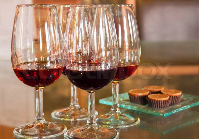 Set of glasses of red ruby port wine, stock photo