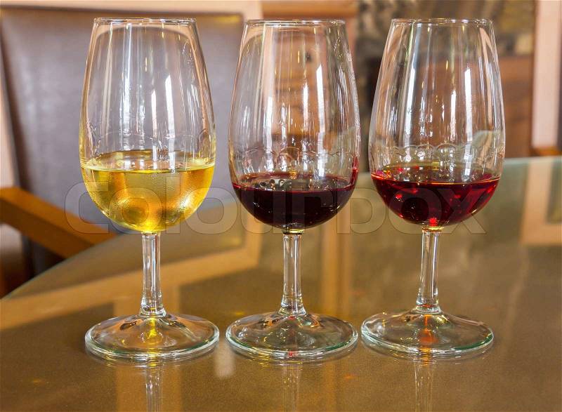 Set of glasses of white , ruby and reserva port wine, stock photo