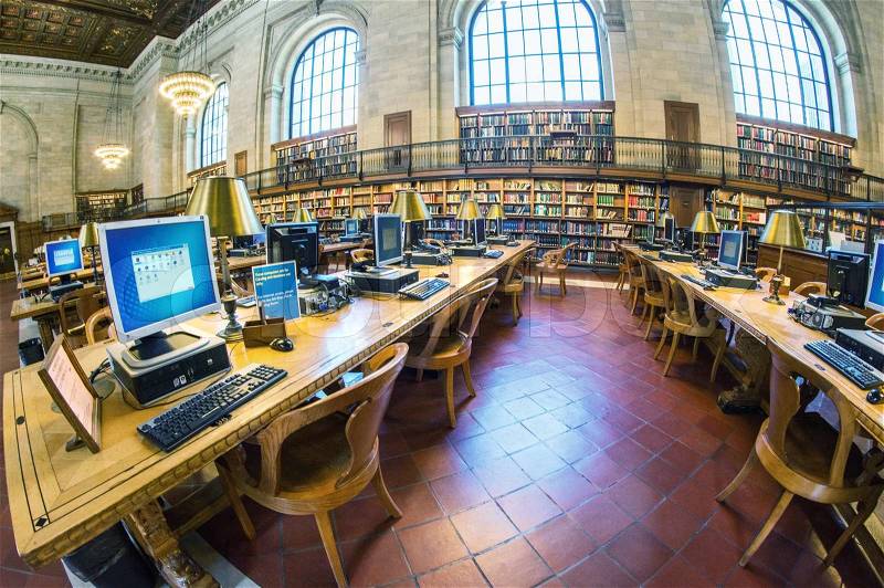 NEW YORK CITY - JUN 12: people study in the New York Public Library on June 12, 2013 in Manhattan, New York City. New York Public Library is the third largest public library in North America, stock photo