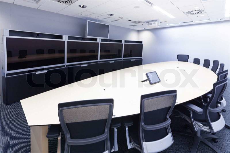 Teleconferencing, video conference and telepresence business meeting room, stock photo