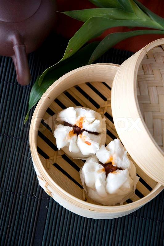 Chinese bun salapao put in bamboo tray, stock photo