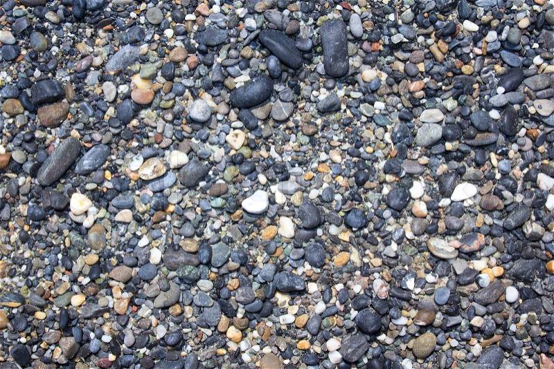 Close up of wet river stones background, stock photo