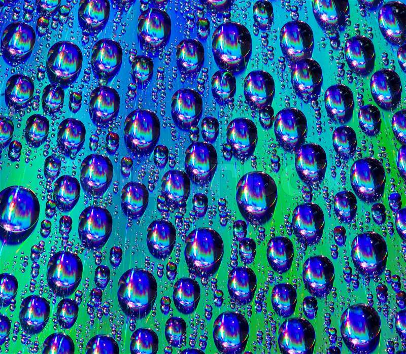 Colorful background from water drops, stock photo