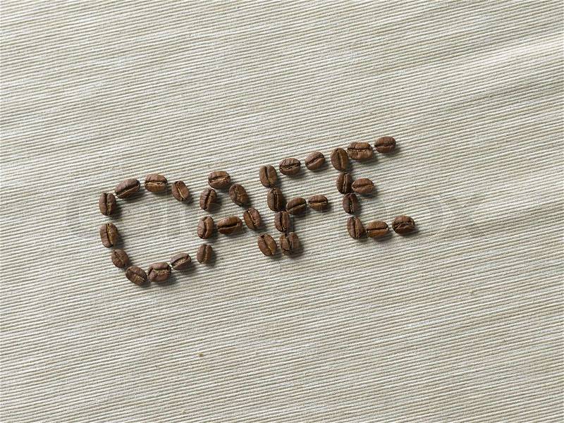 Coffee beans with the word cafe, stock photo