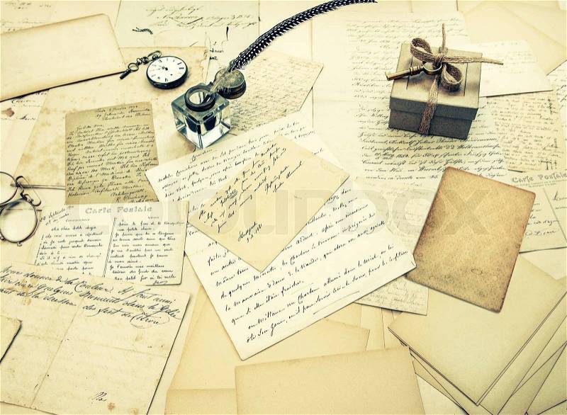 Old letters, vintage postcards and antique feather pen. nostalgic sentimental background. retro style toned picture, stock photo