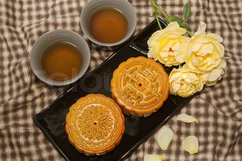 Chinese moon cake with tea , stock photo