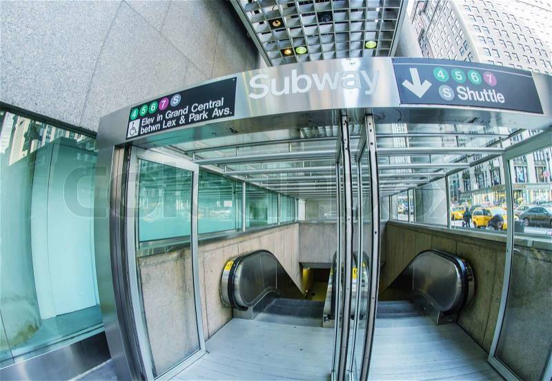 NEW YORK CITY - FEB 11: Subway entrance in midtown Manhattan on February 11, 2012. Subway system has 468 stations in operation, stock photo