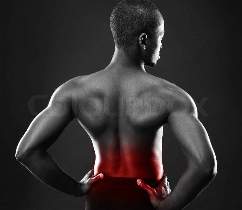 Back view portrait of a african man over black background, stock photo