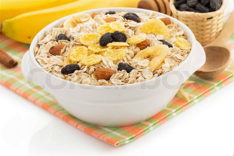Bowl of cereals muesli isolated on white background, stock photo