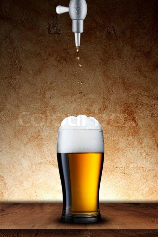 Beer Pour from Machine to Glass, stock photo