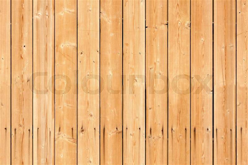 Seamless background texture of new wooden lining boards wall, stock photo