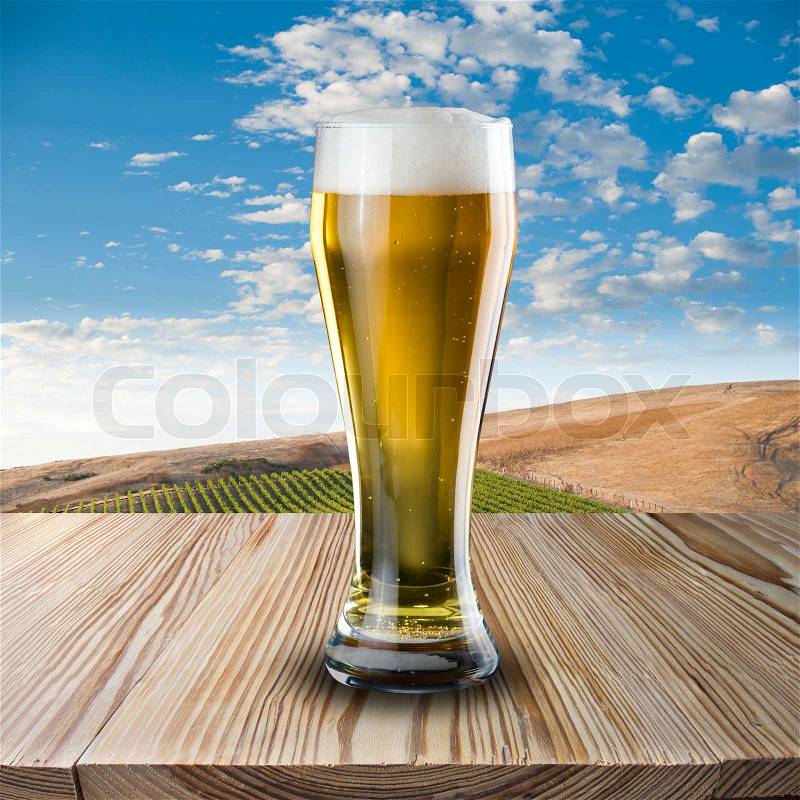 Glass of Cold Beer on Wood, stock photo