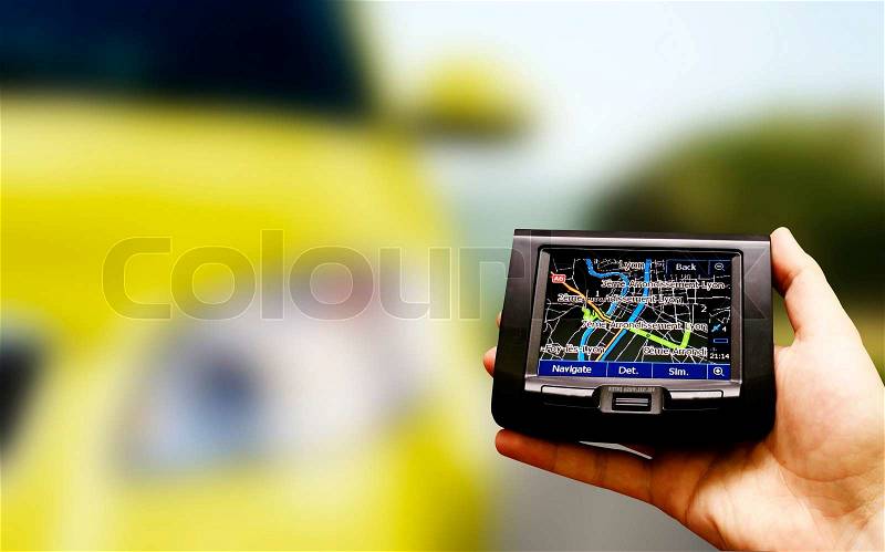 Gps in a man hand. Find your way !, stock photo