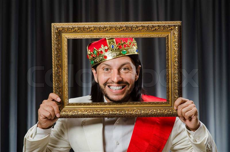 King with picture frame in funny concept, stock photo
