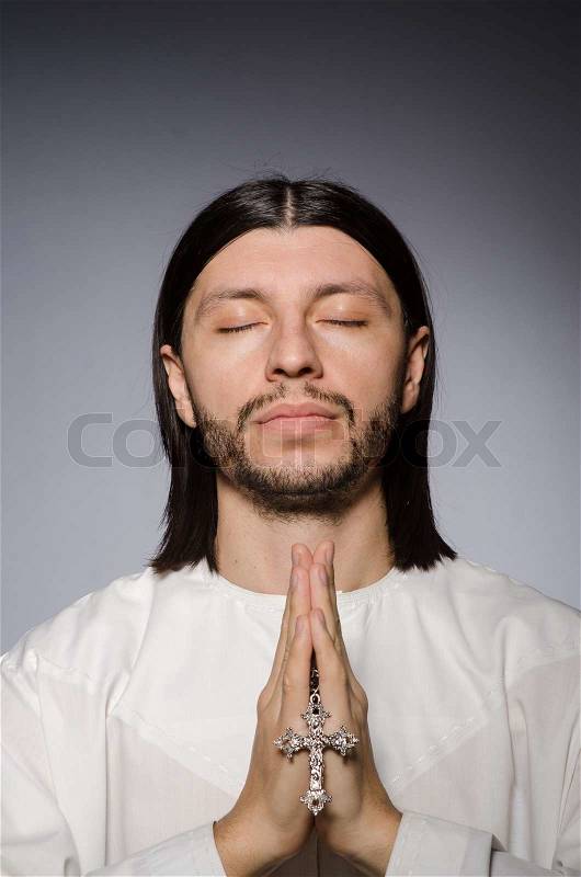 Priest man in religious concept, stock photo - 11126084-priest-man-in-religious-concept