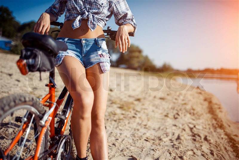 Cyclist in profile, sunny day , stock photo