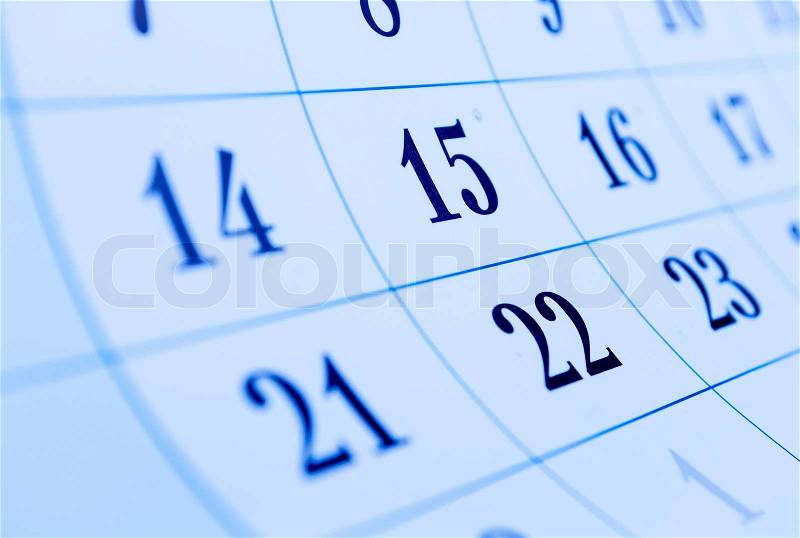 Oblique view of a blank calendar with selective focus to the dates for the 15th and 22nd of the month conceptual of organization, setting a reminder and scheduling, stock photo
