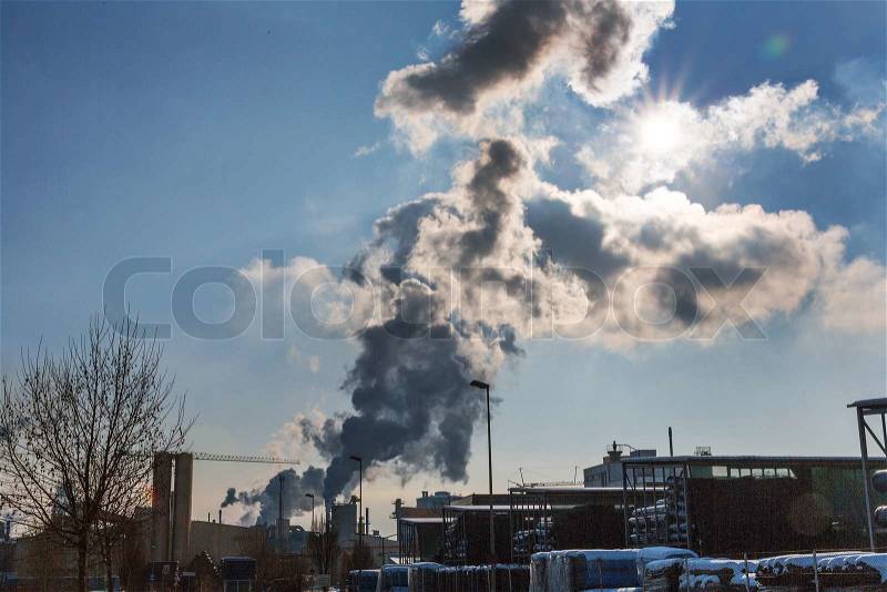 Vent an industrial plant with smoke. symbol photo for environmental protection and ozone, stock photo