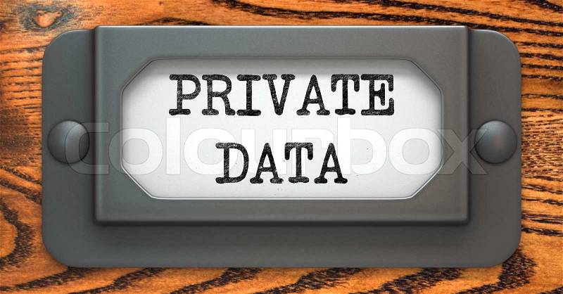 Private Data - Inscription on File Drawer Label on a Wooden Background, stock photo