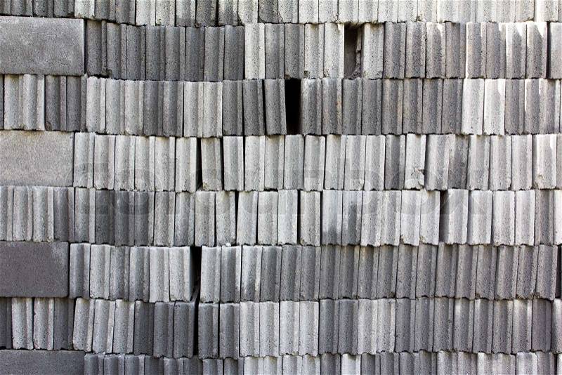 Stack of cinder block wall background, brick texture , stock photo