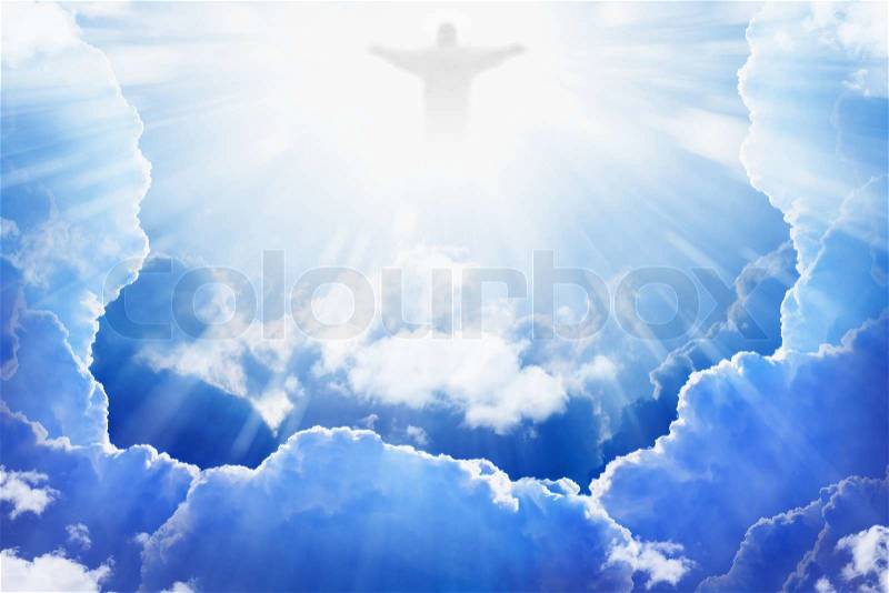 Jesus Christ in blue sky with clouds, bright light from heaven, resurrection, easter, stock photo