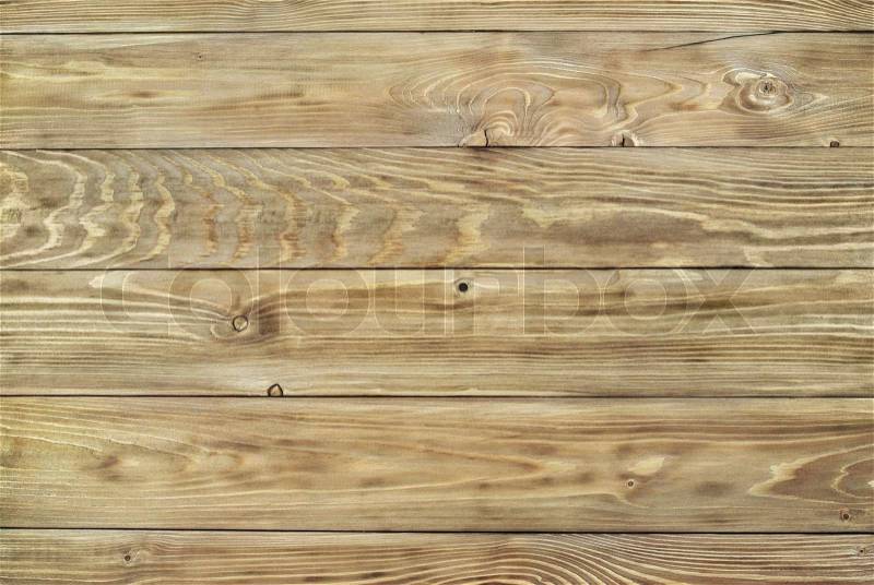 Texture of the fibers planed wooden pine boards, stock photo