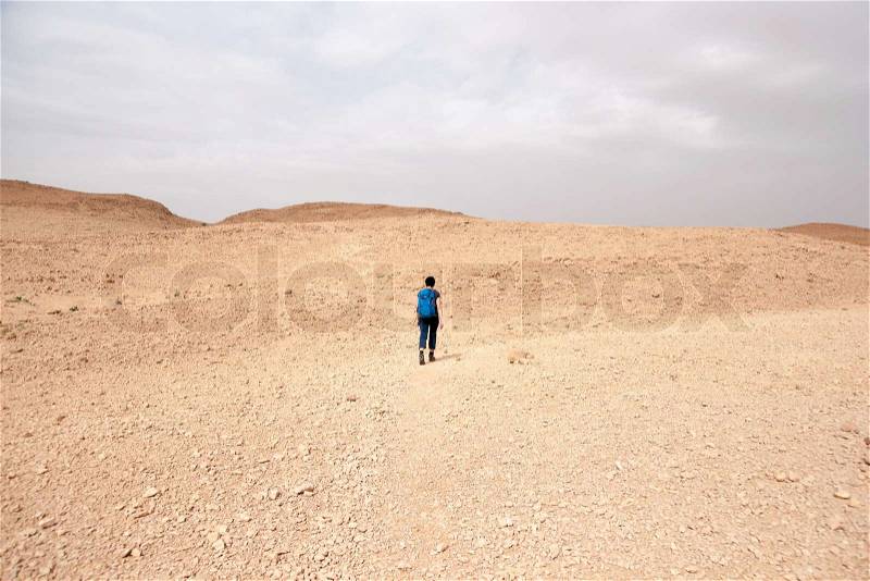 Travel in stone desert hiking activity adventure, stock photo