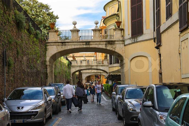 ROME, ITALY - MAY 04, 2014: People on the street Via della Pilotta in Rome, Italy, stock photo